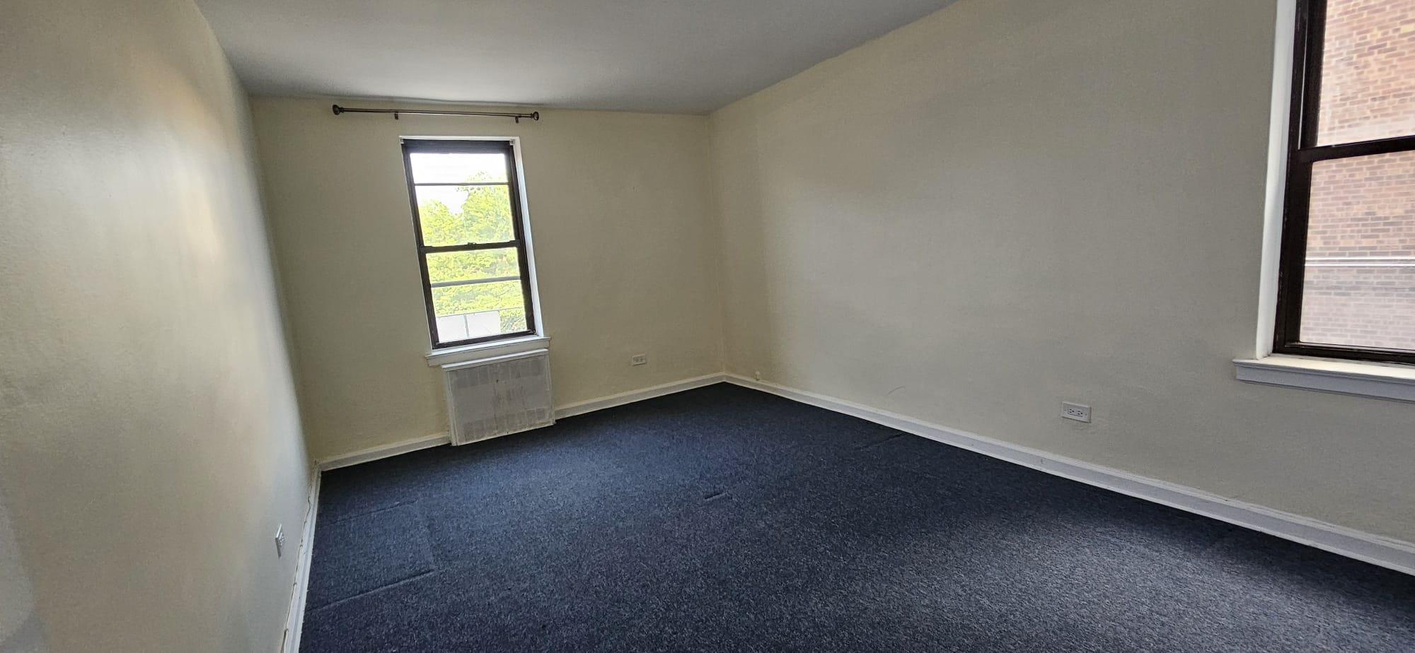 65-35 108th Street, Unit B7 Queens, NY 11375 - Photo 5 of 6 an empty room with windows