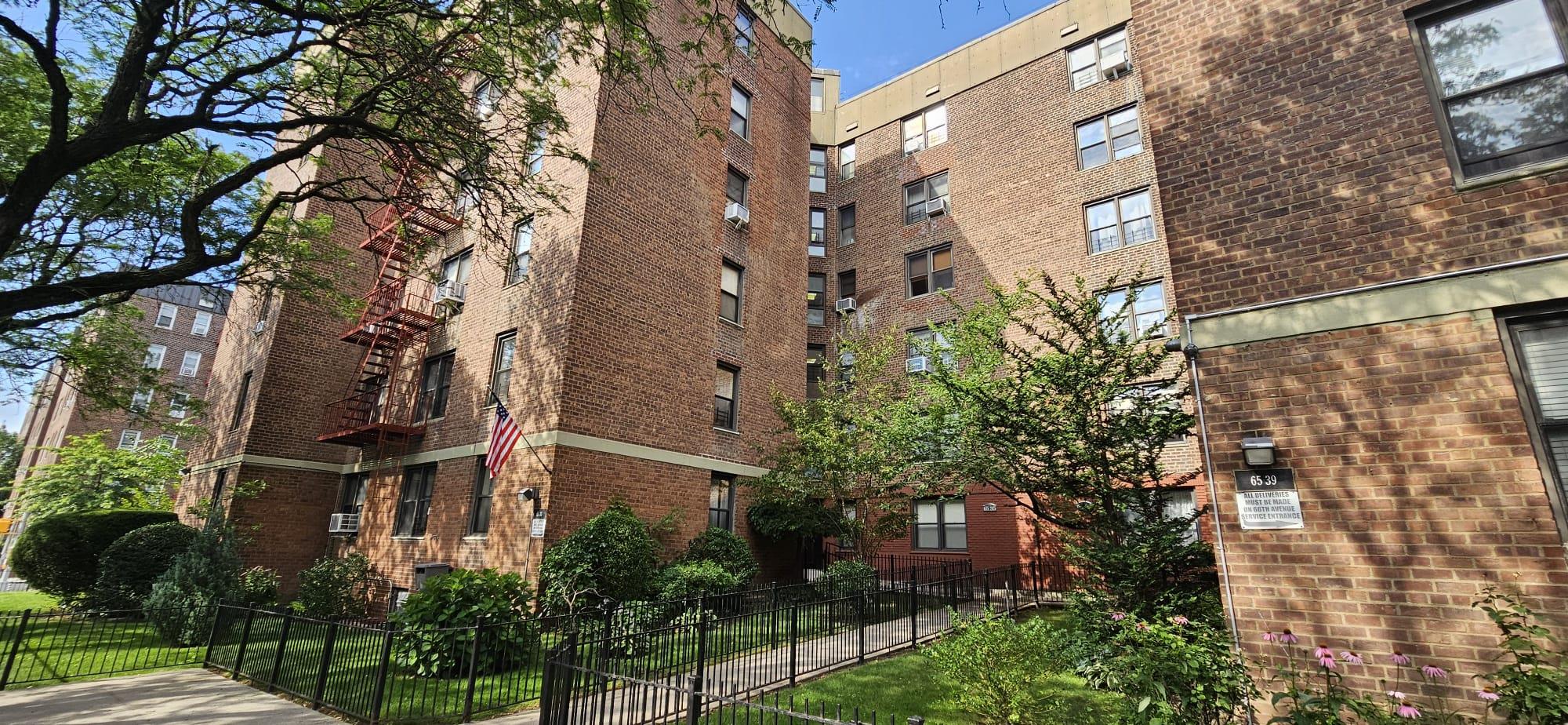 65-35 108th Street, Unit B7 Queens, NY 11375 - Photo 6 of 6 a view of a multi story building