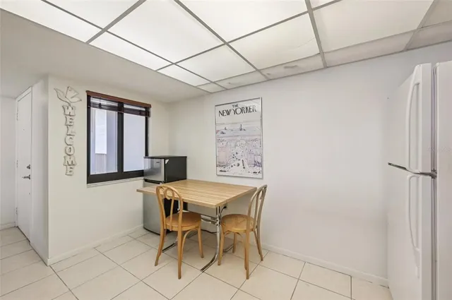 a room with a bed and a chair