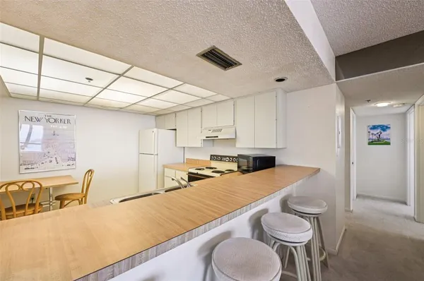 a bathroom with a glass door shower