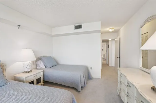 a view of a chairs and table in the patio
