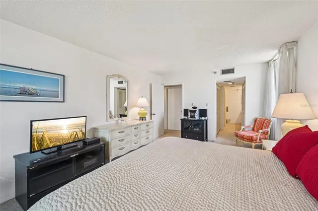 an aerial view of a city with an ocean view