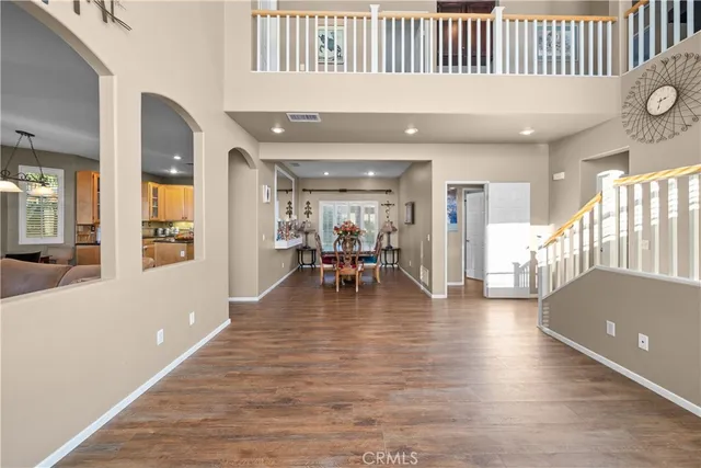 a view of a livingroom with furniture and wooden floor