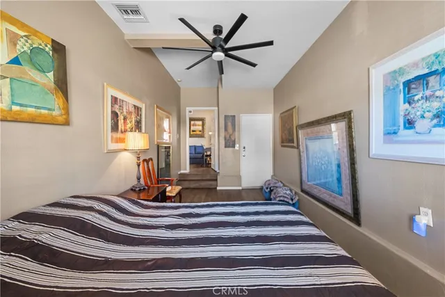 a view of a patio with a table chairs and a backyard