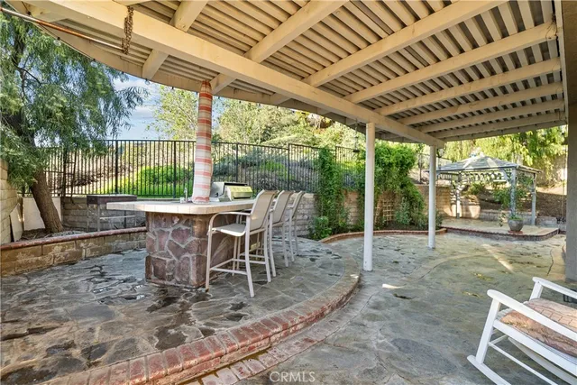 a view of a house with backyard and porch