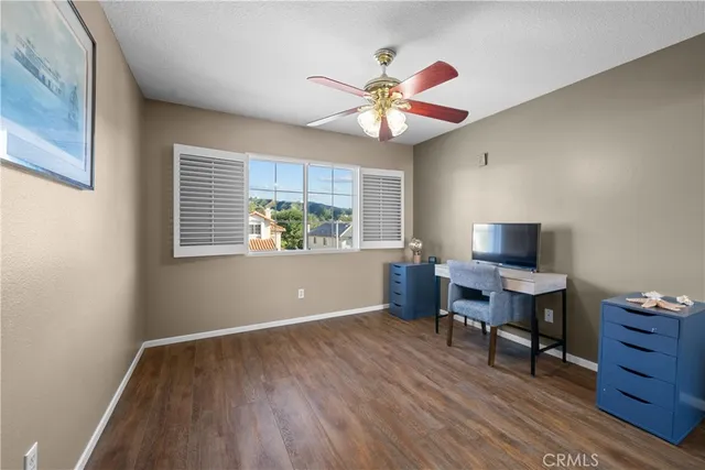 a view of livingroom with furniture and wooden floor