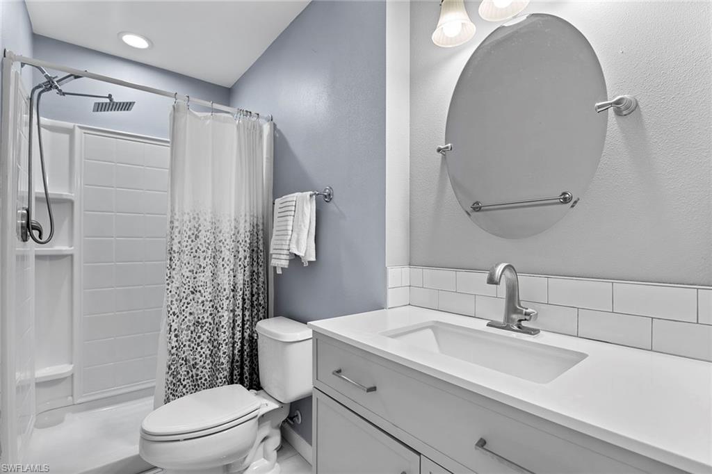 14929 Wise Way, Unit 931 Fort Myers, FL 33905 - Photo 12 of 39 a bathroom with a sink toilet and shower