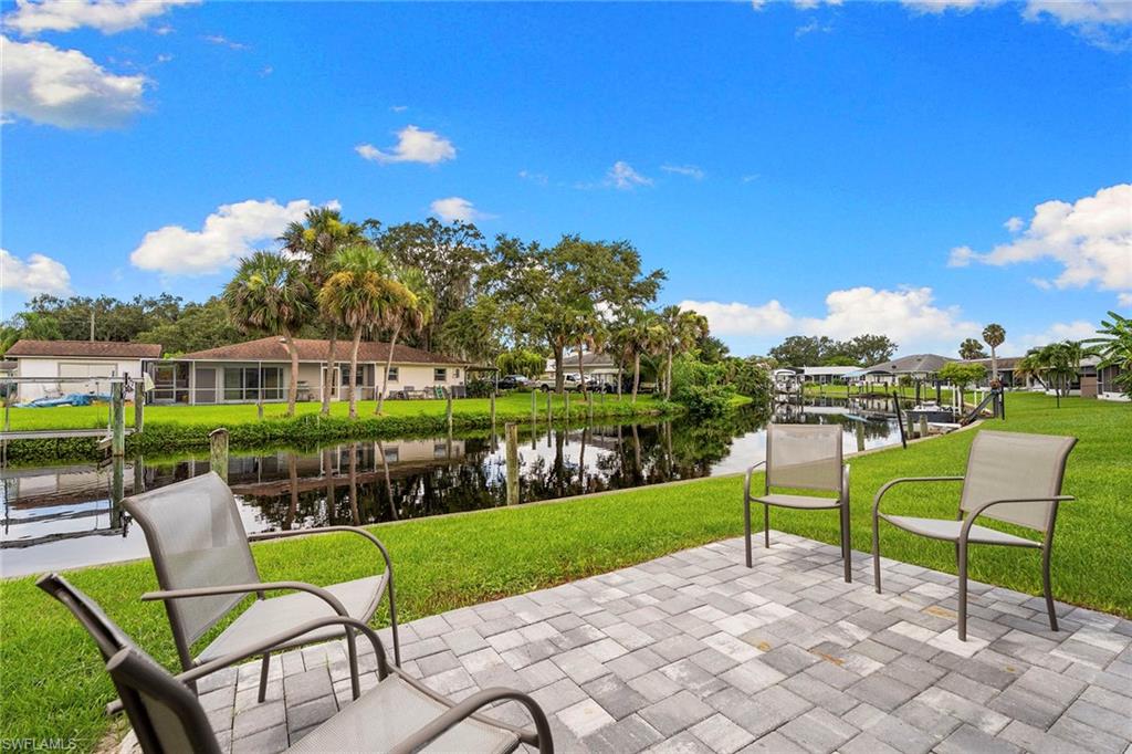 14929 Wise Way, Unit 931 Fort Myers, FL 33905 - Photo 16 of 39 a view of a chairs in a park