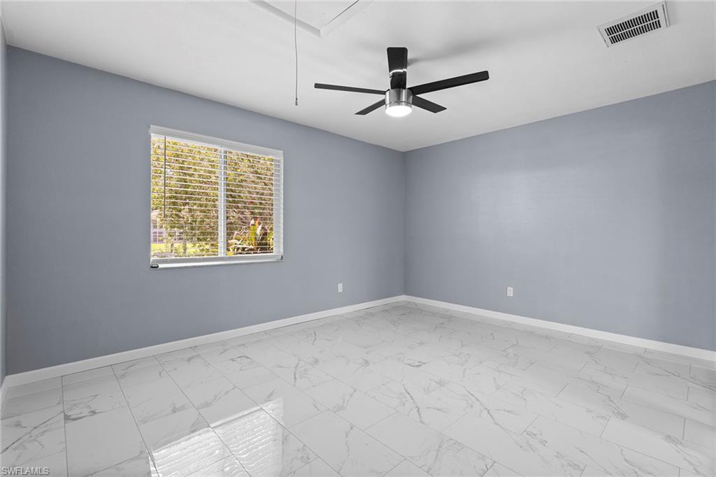 14929 Wise Way, Unit 931 Fort Myers, FL 33905 - Photo 26 of 39 a view of an empty room with a window