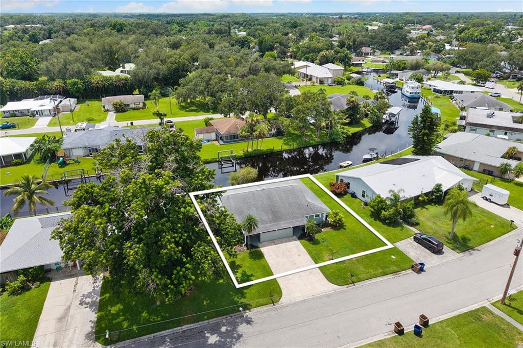 14929 Wise Way, Unit 931 Fort Myers, FL 33905 - Photo 32 of 39 an aerial view of a pool yard and mountain view in back