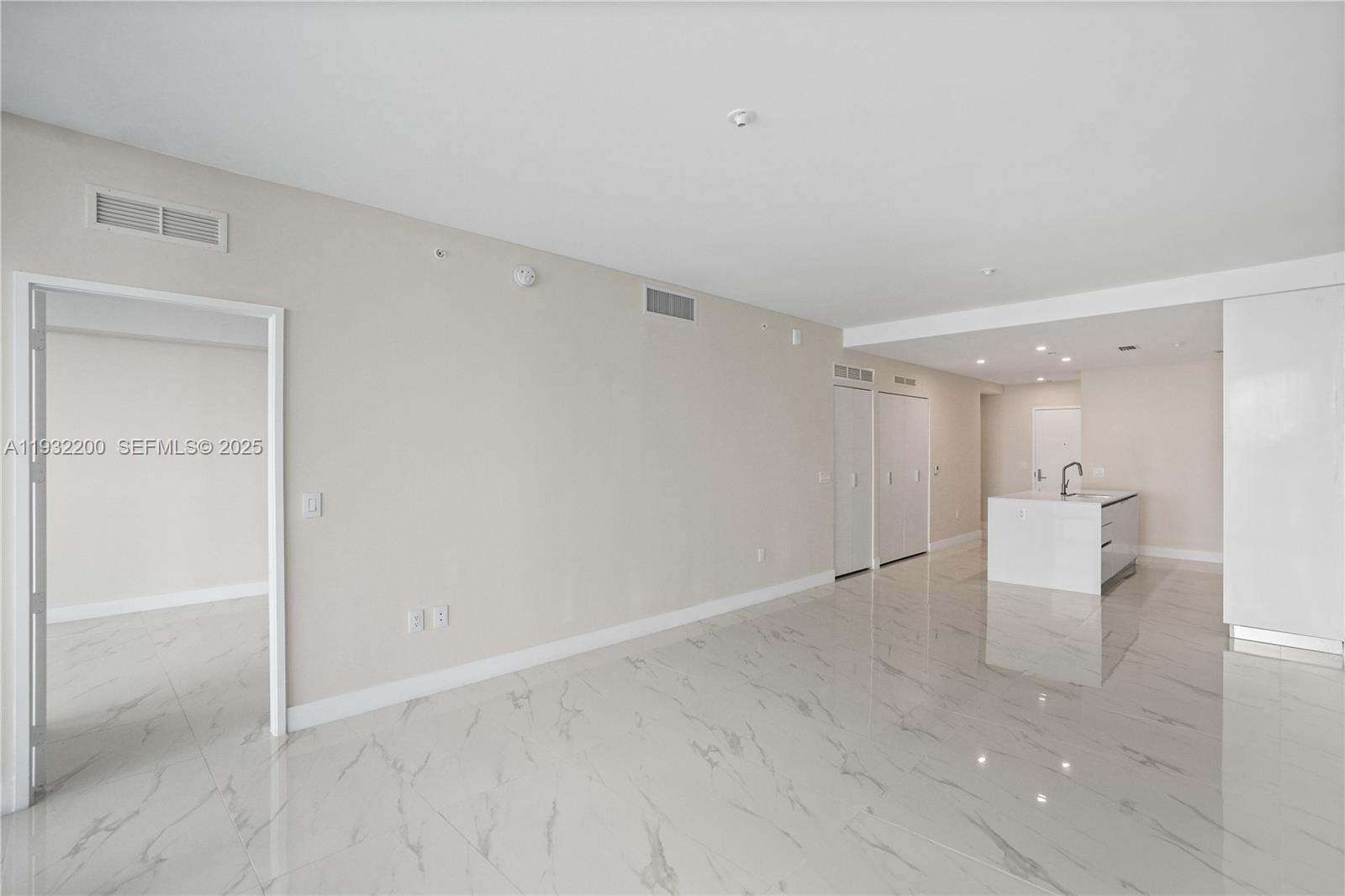 700 Northeast 24th Street, Unit 602 Miami, FL 33137 - Photo 24 of 39 wooden floor in an empty room