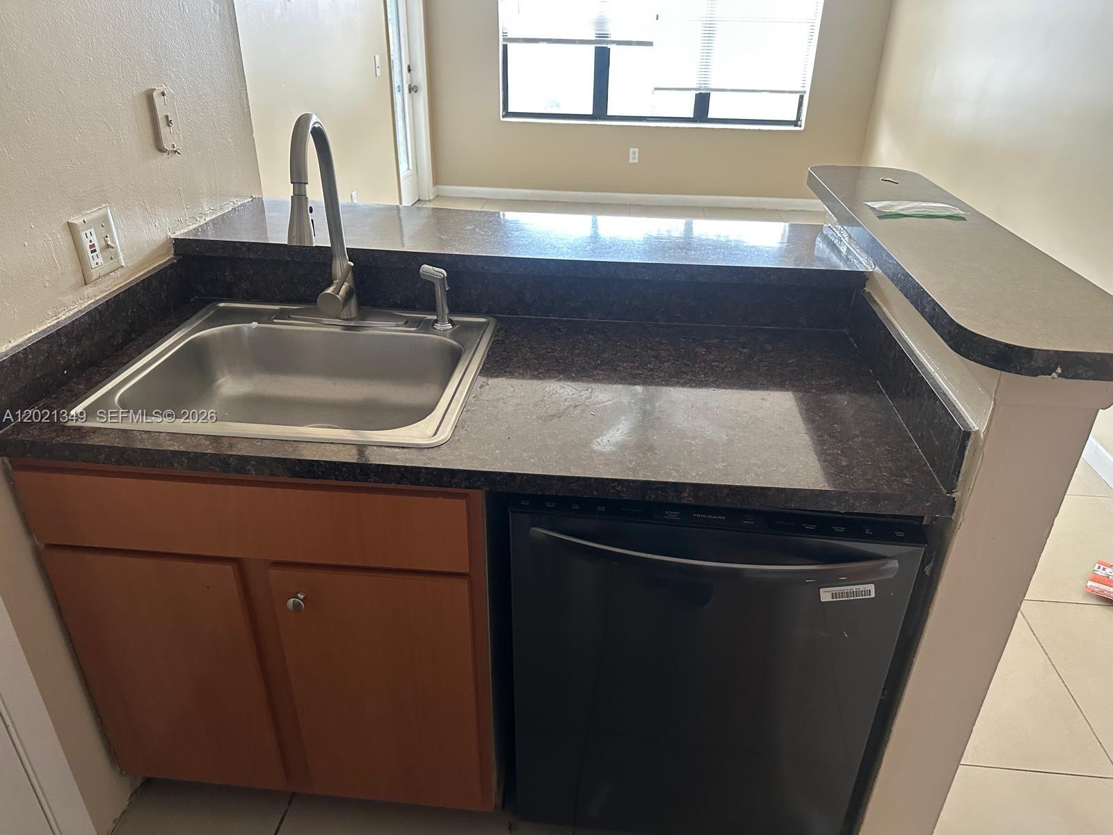 4481 West McNab Road, Unit 37 Pompano Beach, FL 33069 - Photo 12 of 20 a close view of sink and tap