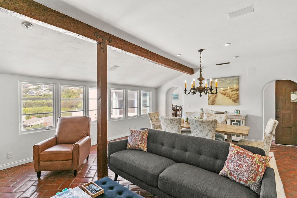 52 Emerald Bay Laguna Beach, CA 92651 - Photo 13 of 31 a living room with furniture and a large window