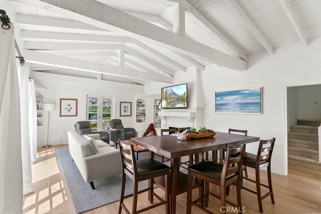 52 Emerald Bay Laguna Beach, CA 92651 - Photo 6 of 31 a dining room with furniture and window