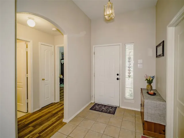 a view of room with furniture and natural light