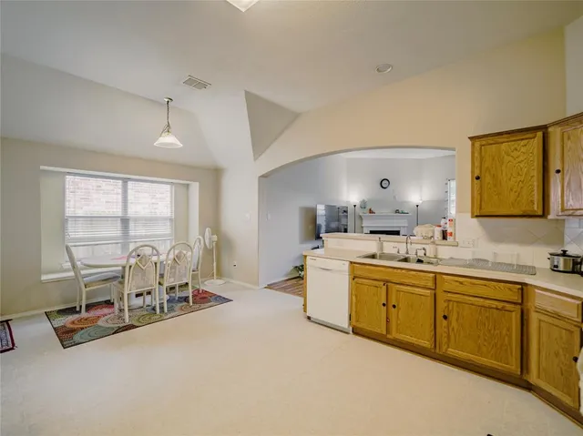 a room with gym equipment and a large window