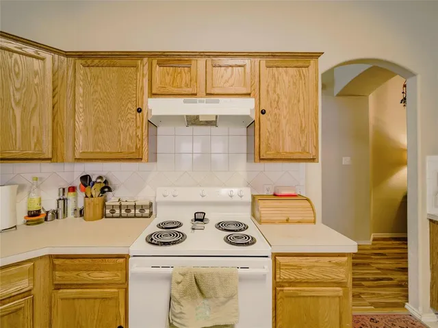 a utility room with a sink washer and dryer