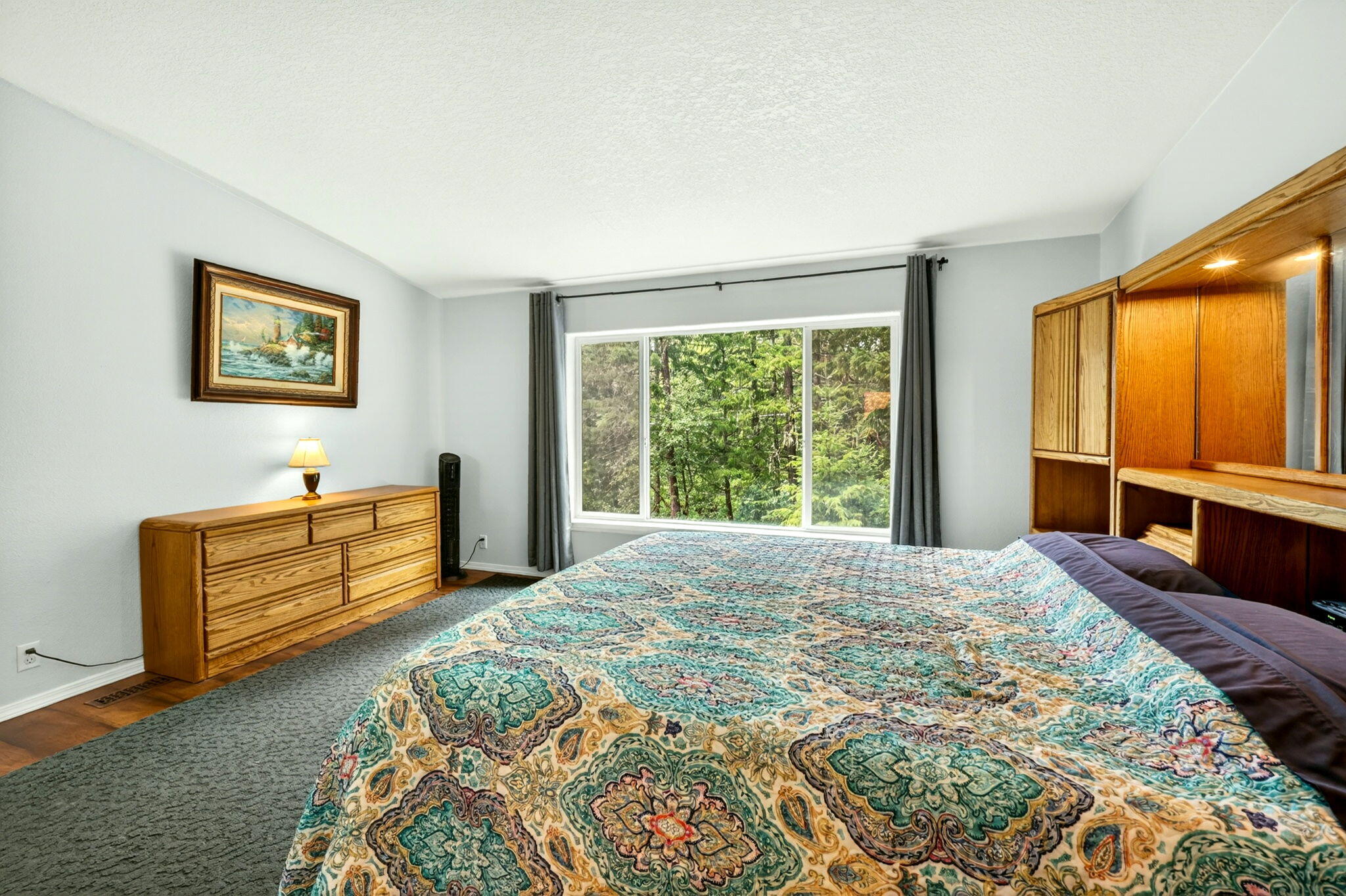 5445 Thompson Creek Road Selma, OR 97538 - Photo 26 of 57 a bed room with a bed and a window