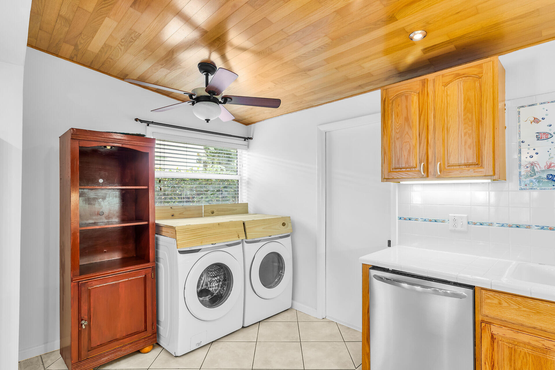 13 Bass Avenue Key Largo, FL 33037 - Photo 16 of 43 a utility room with dryer and washer