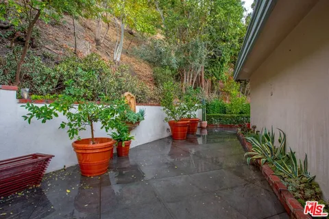 a garden view with a seating space
