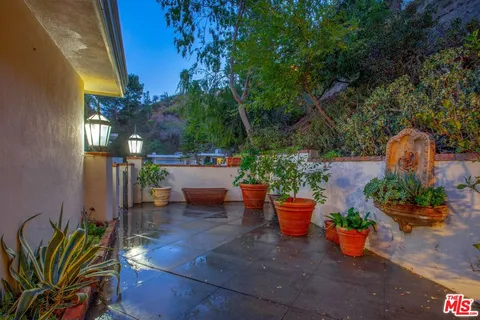 a garden view with a seating space