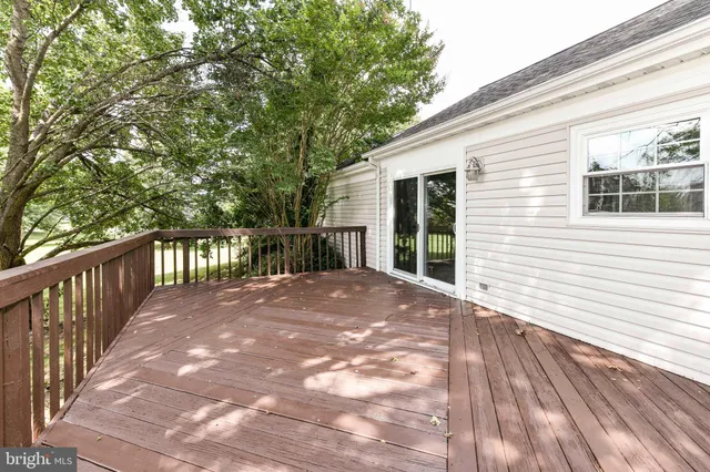 a view of a wooden roof deck