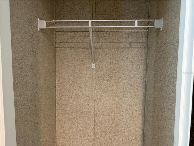 a bathroom with a glass door