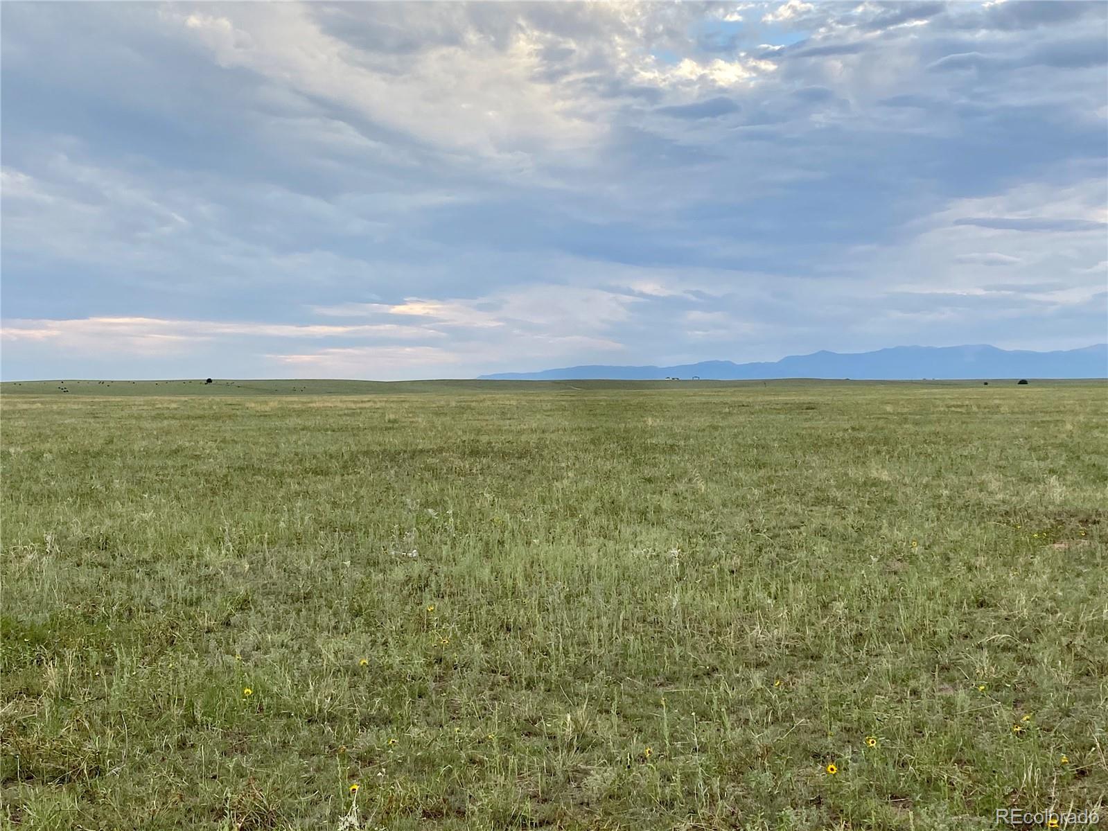 3 North Log Road Calhan, CO 80808 - Photo 2 of 10 a view of an ocean and beach