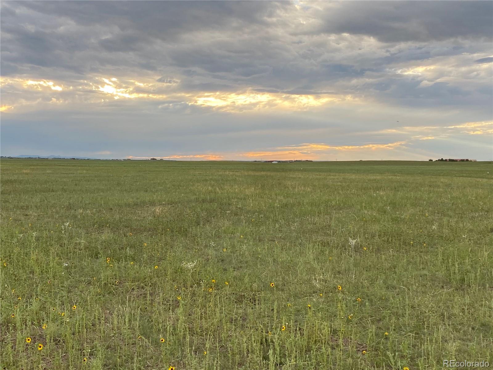 3 North Log Road Calhan, CO 80808 - Photo 4 of 10 a view of an ocean and beach