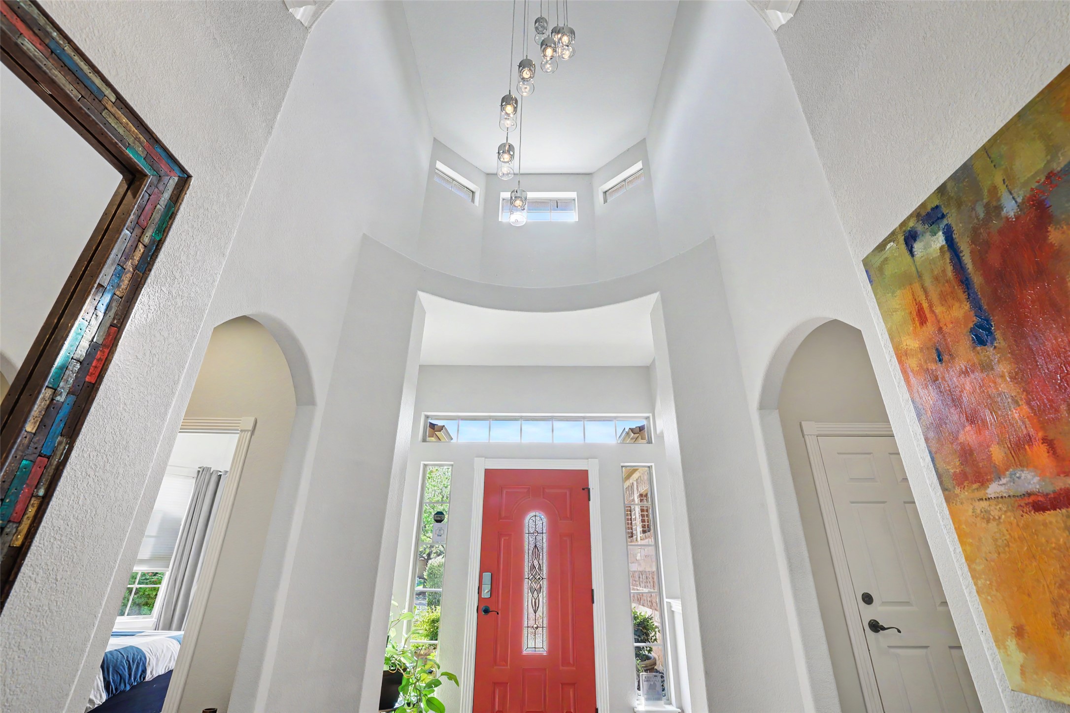 805 Boquilla Trail Georgetown, TX 78633 - Photo 4 of 40 a front view of a house with a door and a chandelier
