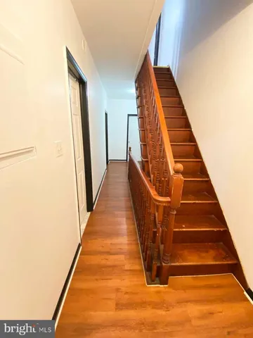 a view of living room with furniture and a flat screen tv