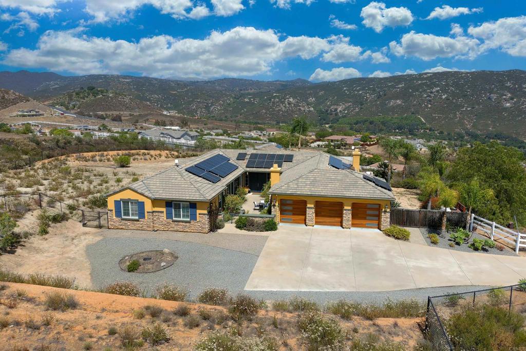 22963 Stokes Road Ramona, CA 92065 - Photo 46 of 57 an aerial view of residential houses with city view