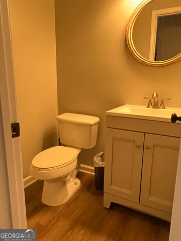 a bathroom with a toilet and a sink