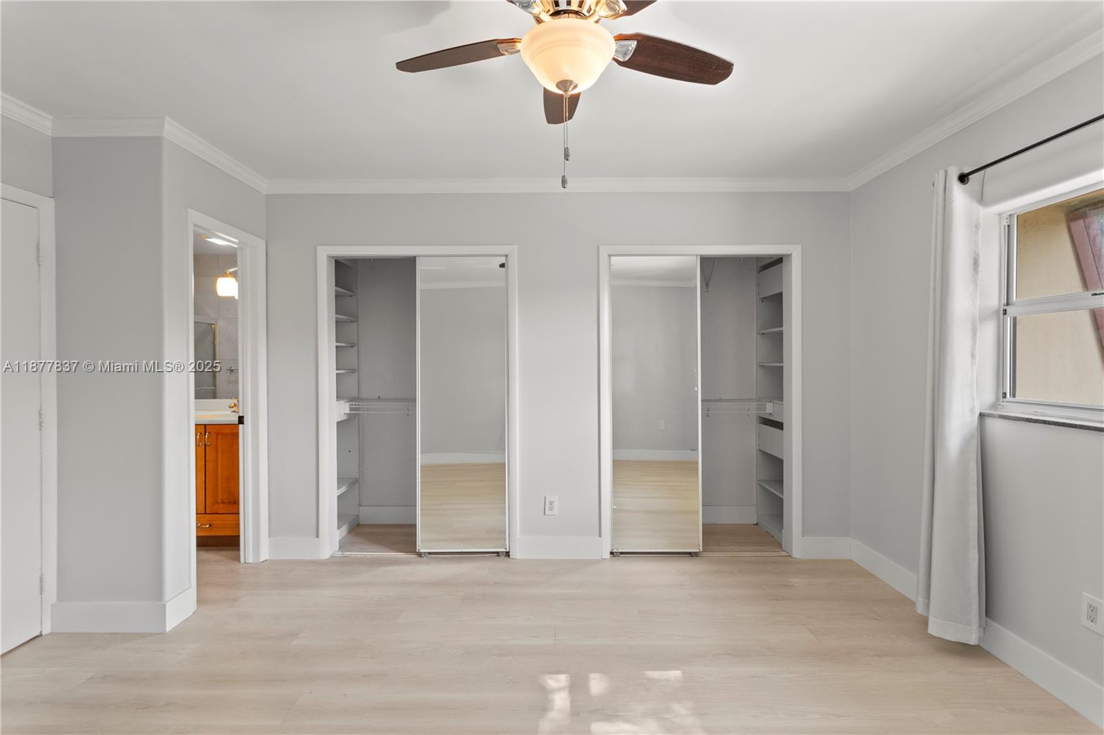 8600 Southwest 67th Avenue, Unit 937 Pinecrest, FL 33156 - Photo 17 of 24 a view of a room with a ceiling fan and entryway