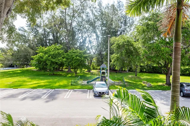 a view of yard with patio