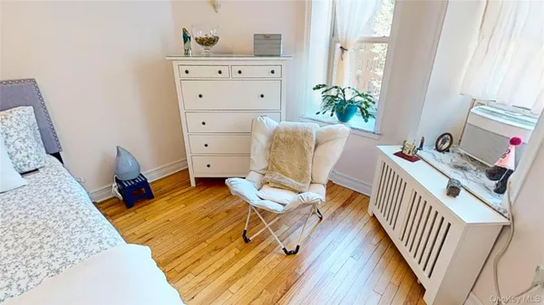 a living room with furniture and window