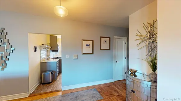 a room with furniture and wooden floor