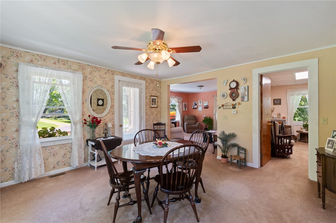 11805 Wilson Road Butler, NY 14590 - Photo 19 of 48 The formal dining area that opens to the covered f