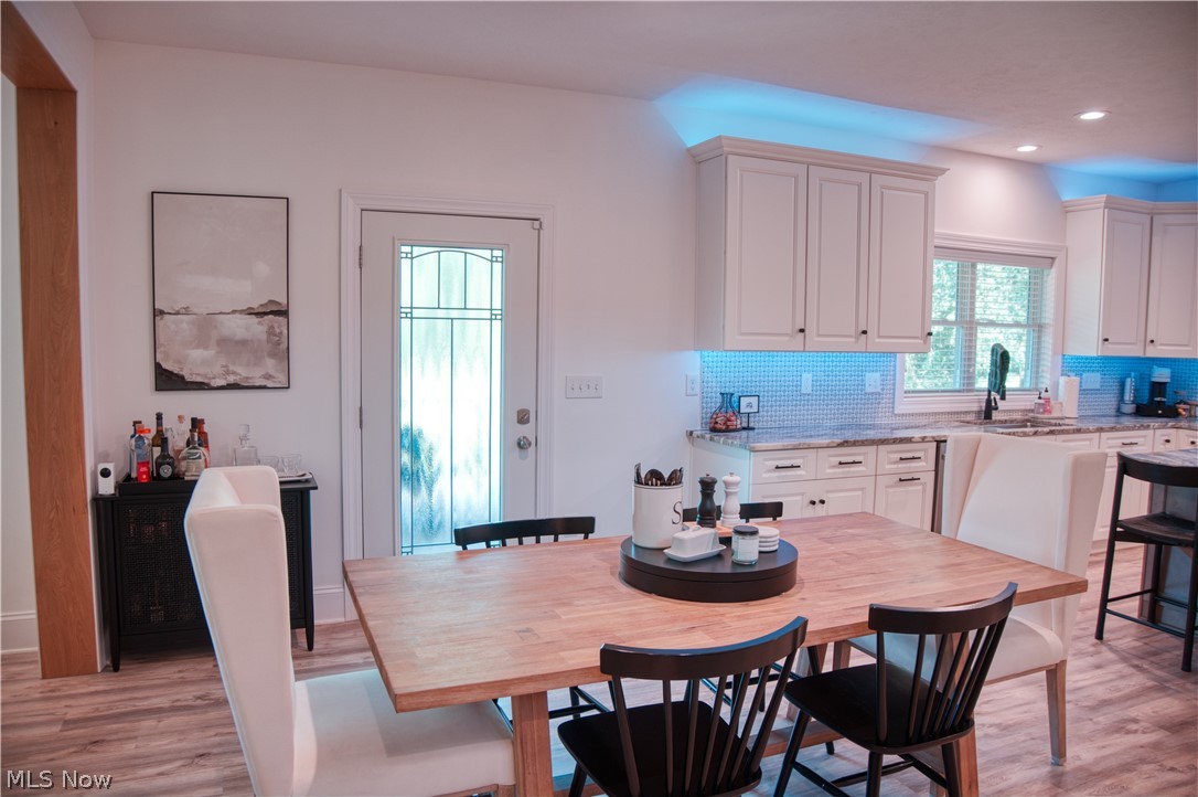 4553 Sharon Copley Road Medina, OH 44256 - Photo 5 of 32 Kitchen dining area featuring wood-finish flooring