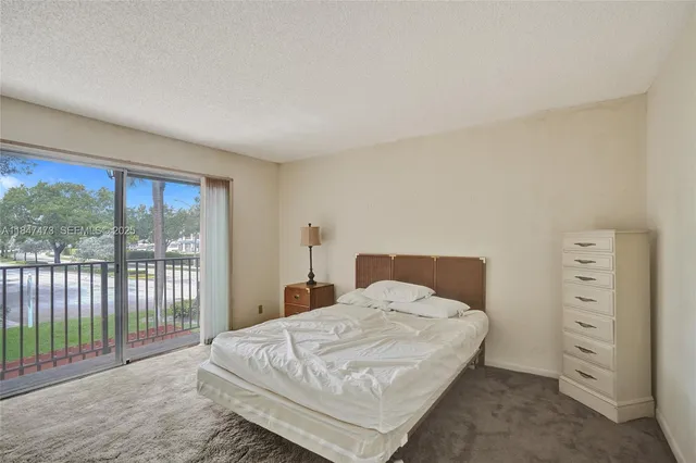 a bedroom with a bed and a floor