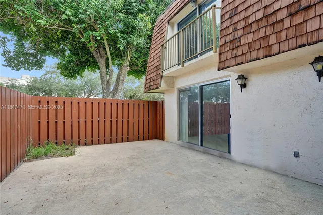 a view of a wooden fence
