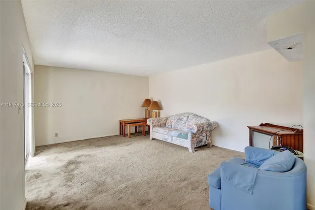 a bedroom with furniture and a couch