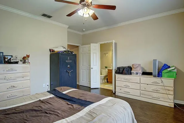 a bedroom with a bed and closet