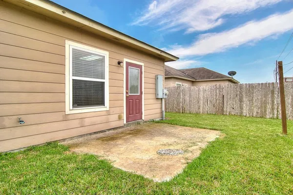 a view of a backyard with a garden