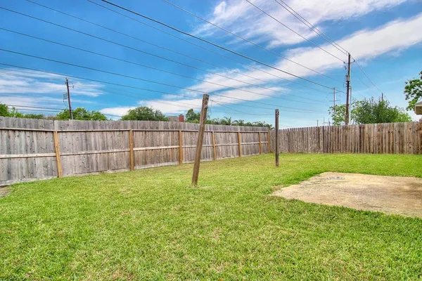 a view of a backyard with a garden