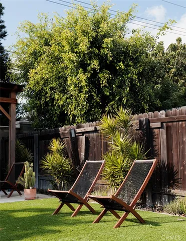 a view of outdoor space with seating area and garden
