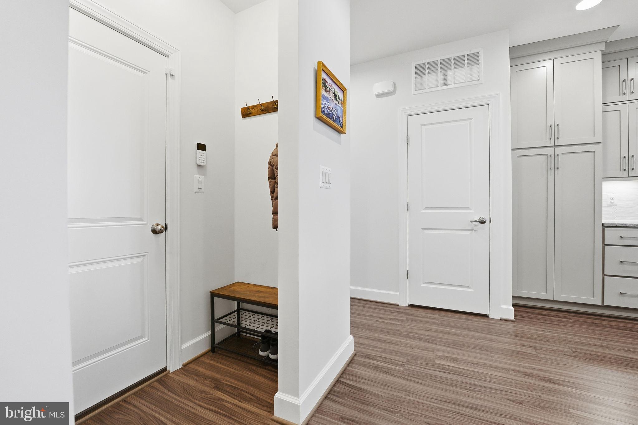 151 Windflower Way Stafford, VA 22554 - Photo 22 of 88 a view of a room with wooden floor and bathroom