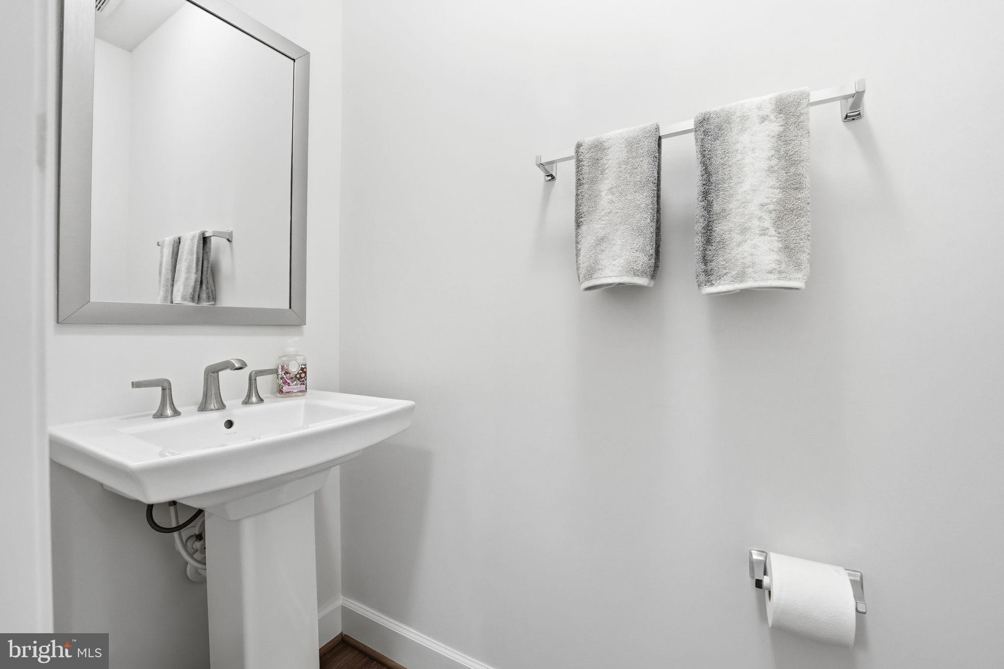 151 Windflower Way Stafford, VA 22554 - Photo 23 of 88 a bathroom with a sink and mirror