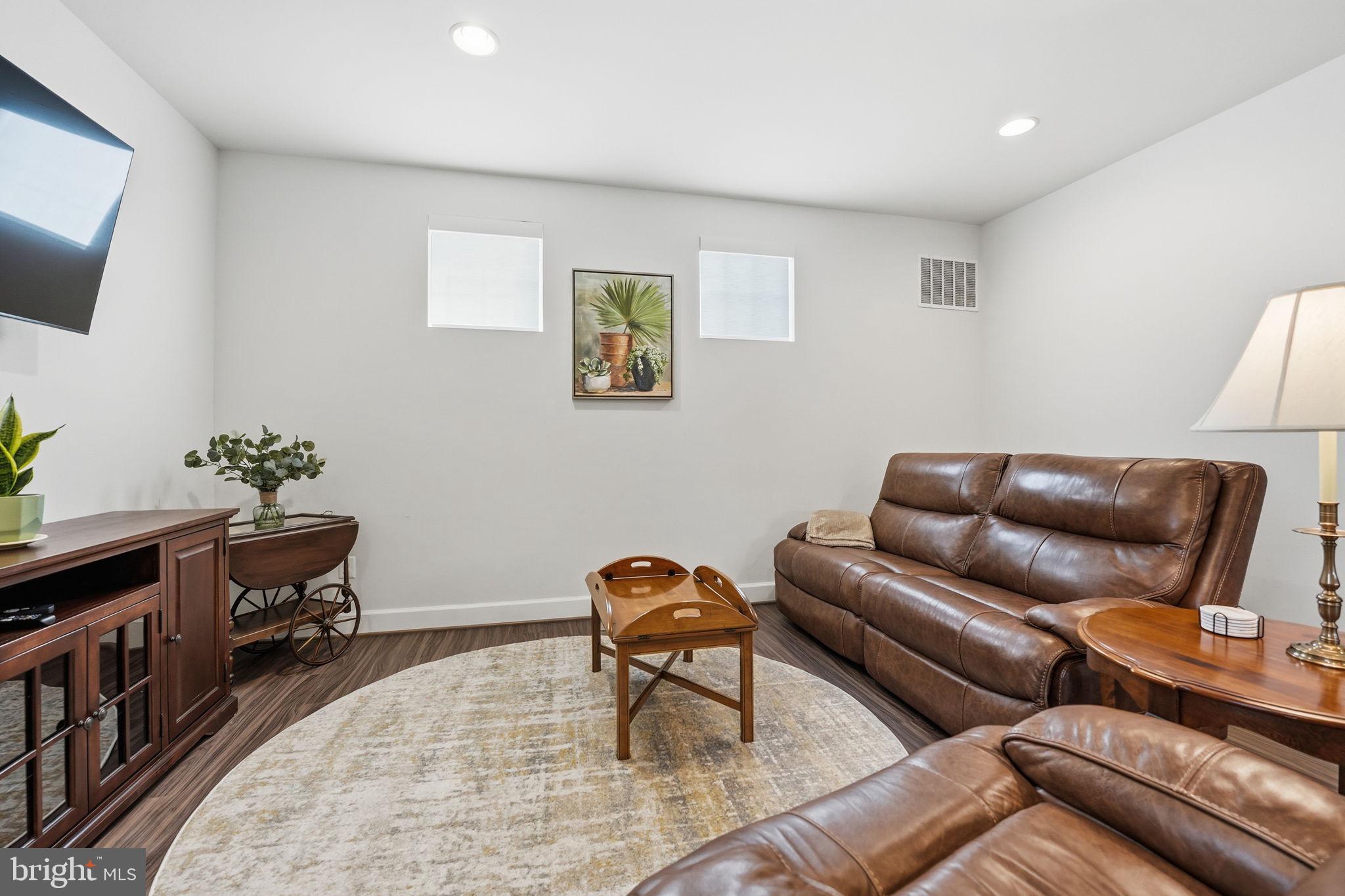 151 Windflower Way Stafford, VA 22554 - Photo 32 of 88 a living room with furniture and a couch