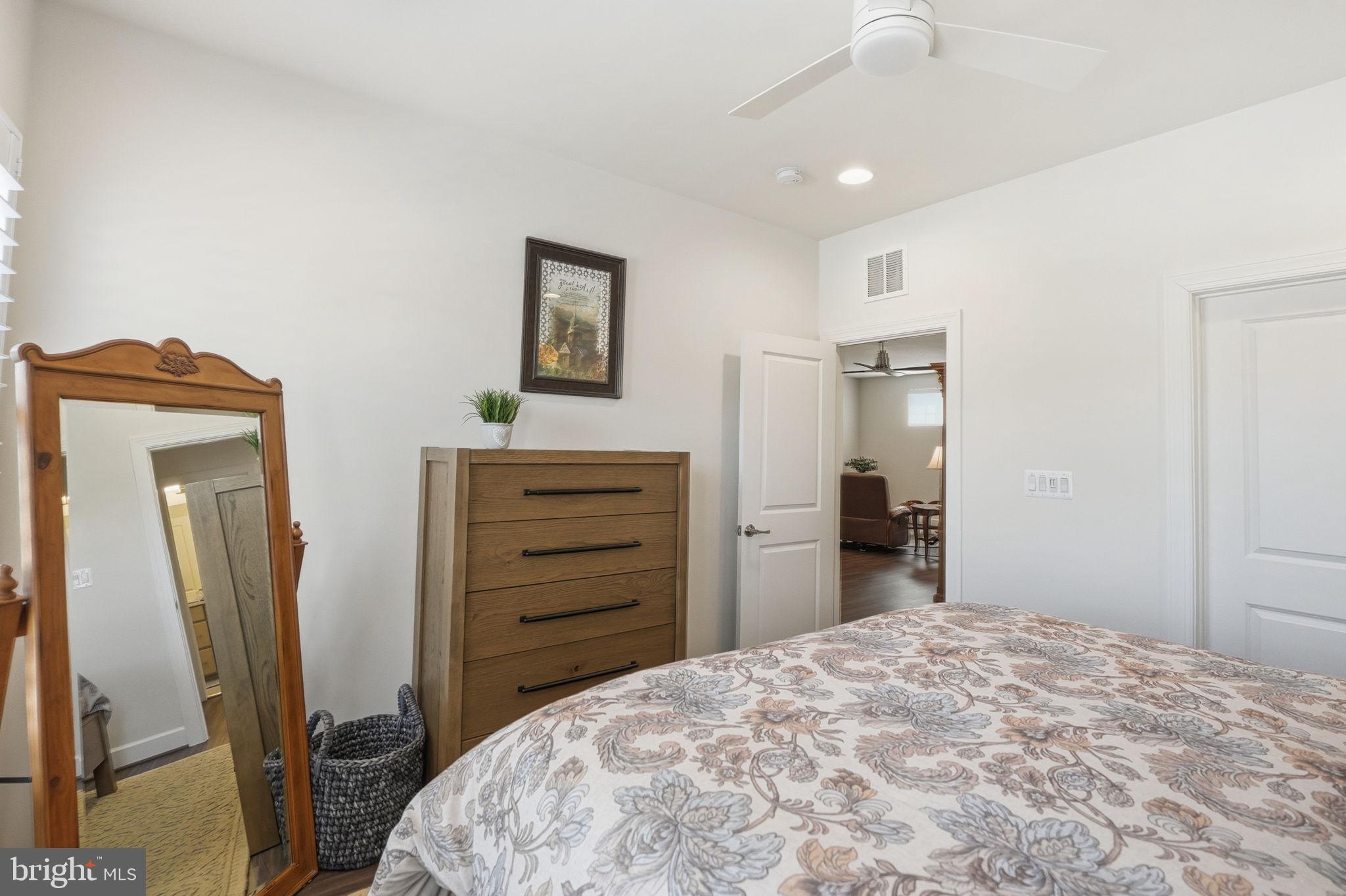 151 Windflower Way Stafford, VA 22554 - Photo 40 of 88 a bedroom with a bed and a bathroom